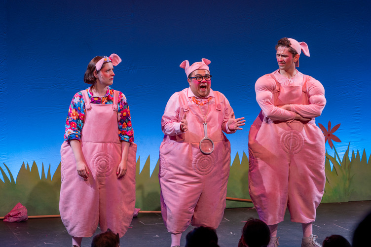 Garid Garcia performing in a musical theater trio